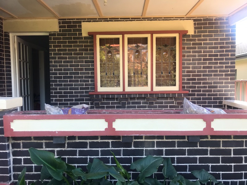 Completed repointing to dark heritage brickwork on a front verandah